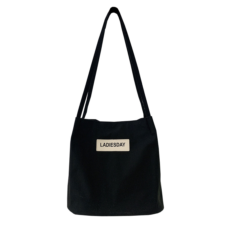 Nylon impermeable bolsa de lona de las mujeres de un solo hombro japonés Harajuku estudiante universitario ins Internet celebridad simple cien bolsa de tela de moda