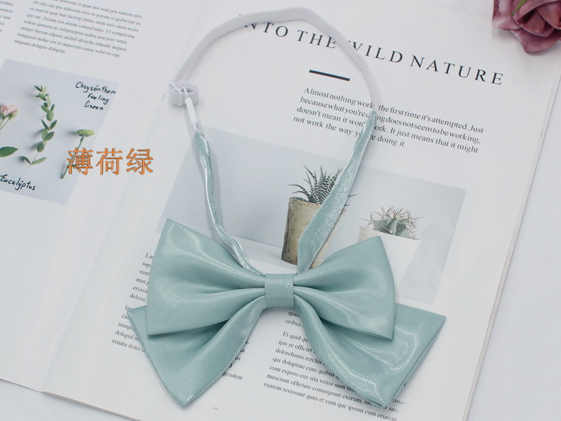 Fábrica en stock al por mayor de Corea Arco de la mariposa de color sólido pajarita collar flor niñas traje de marinero JK pajarita uniforme