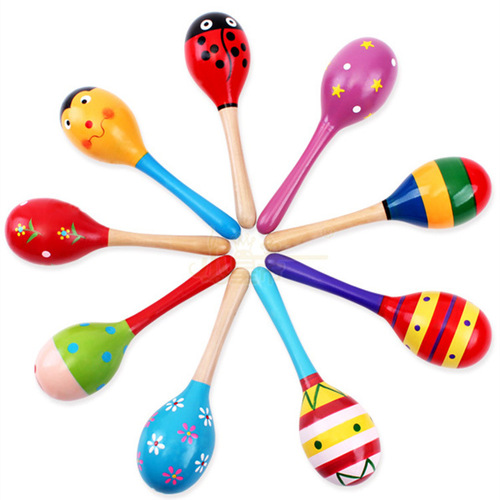 Baby holding educational toy Orff musical instrument wooden cartoon maracas wooden maracas exercise auditory rattle