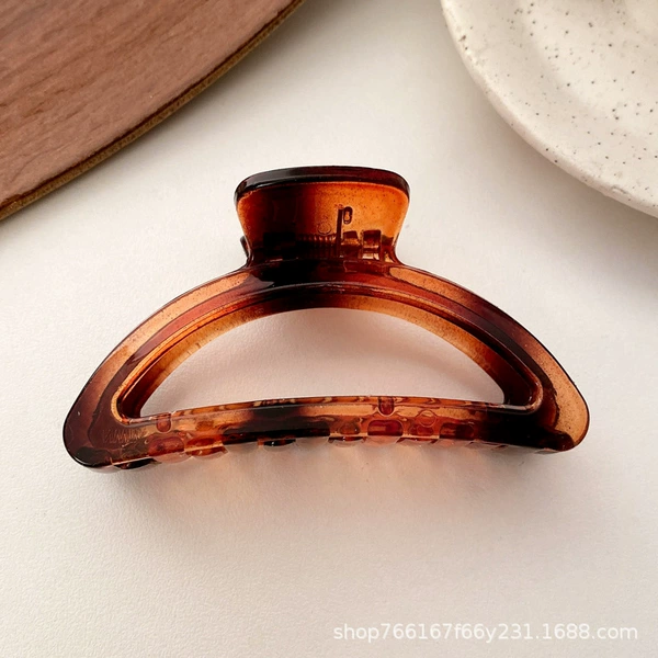 31# amber D-shaped clip.