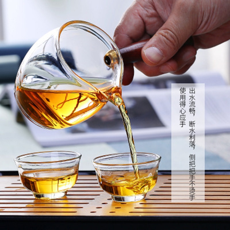 Asa lateral de vidrio taza justa traje de fuga de té juego de té de Kung Fu separación de té de vidrio de borosilicato patrón de malla de martillo Té Mar