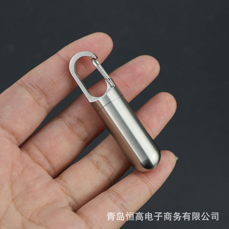 Botella de almacenamiento de acero inoxidable almacén sellado a prueba de humedad almacén impermeable portátil pastillero transfronterizo mini botella de medicina de titanio puro