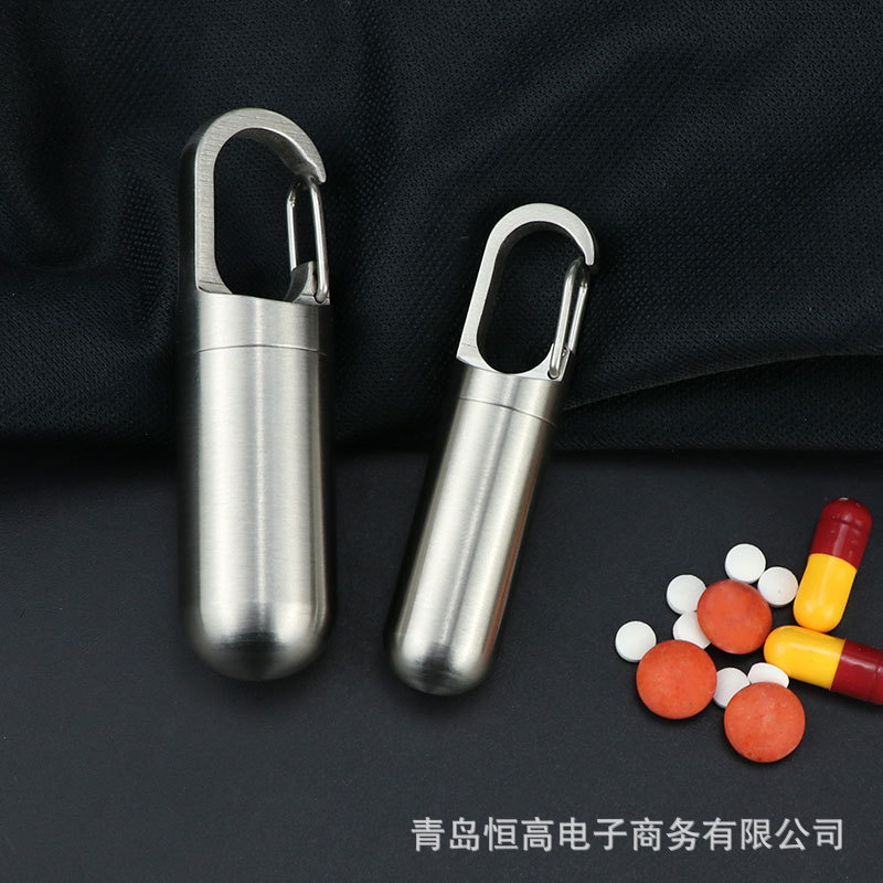 Botella de almacenamiento de acero inoxidable almacén sellado a prueba de humedad almacén impermeable portátil pastillero transfronterizo mini botella de medicina de titanio puro