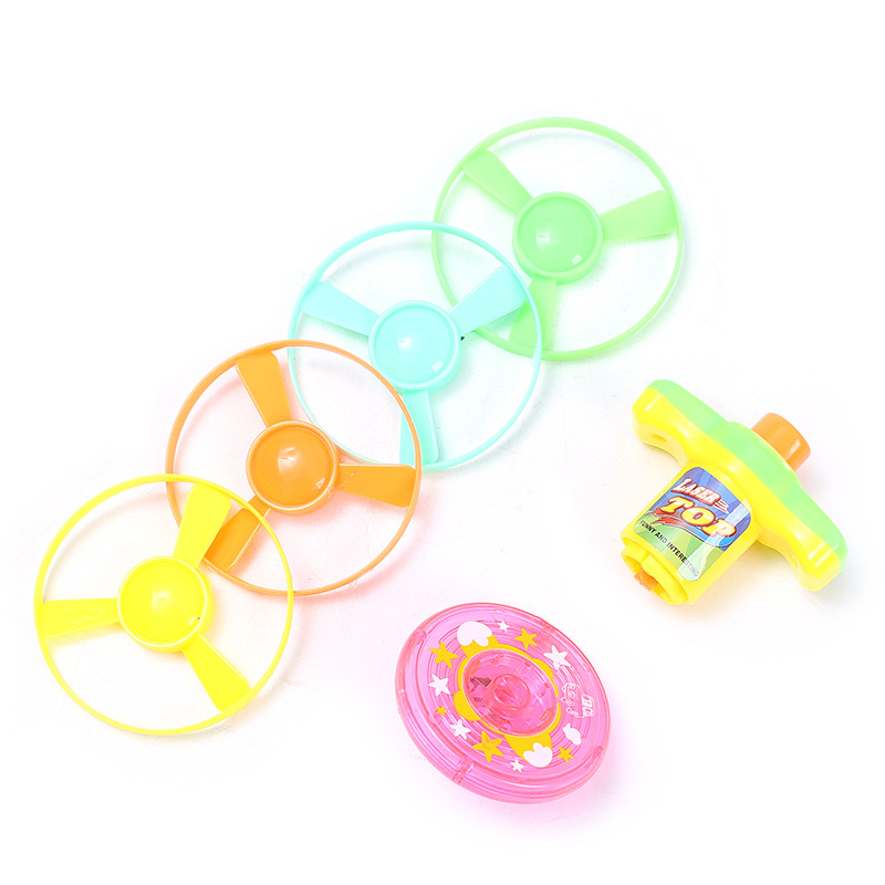 Suministro transfronterizo de los niños juguetes de entretenimiento educativo y de ocio/2-en-1 luminoso UFO pistola juguetes traje al por mayor