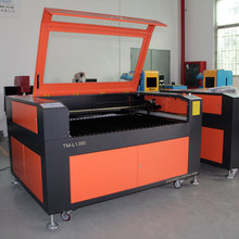 供应广告灯箱器材激光雕刻机 服装辅助面料激光雕刻机