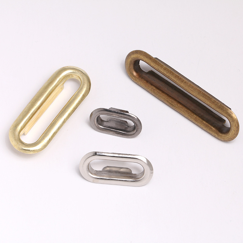 厂家直供铜槽扣金属扣 椭圆气眼 旦鸡蛋形U型鸡眼扣 金属长眼凤眼