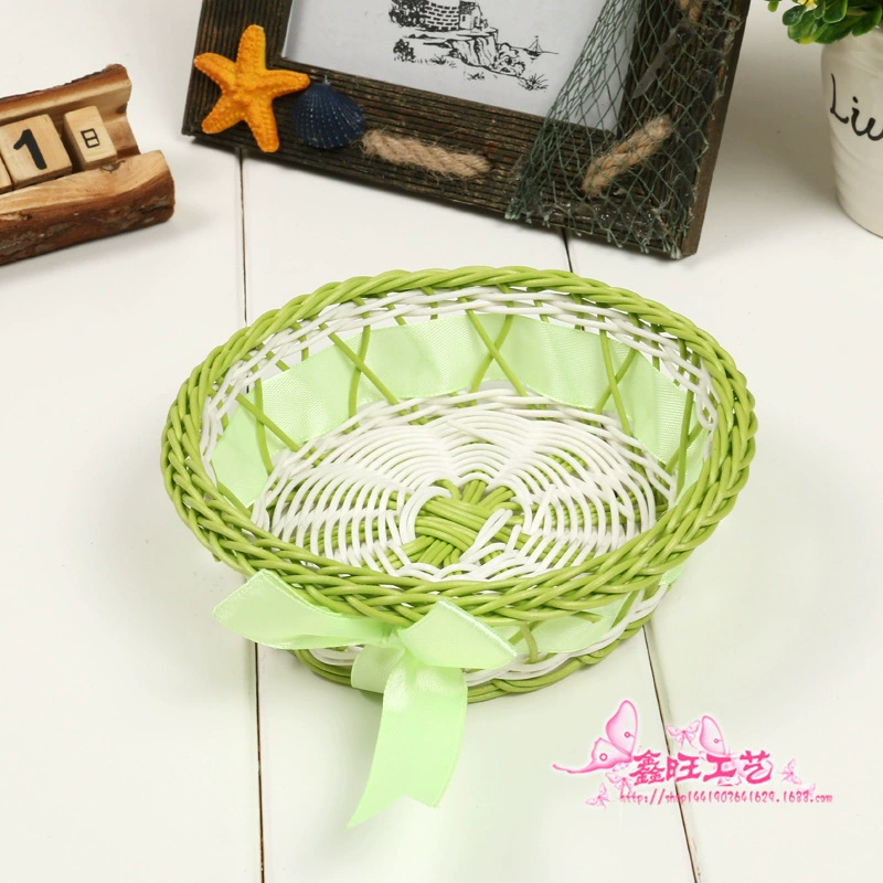 Factory direct sales of plastic rattan woven storage baskets, home sundries storage baskets, bow ornaments wholesale