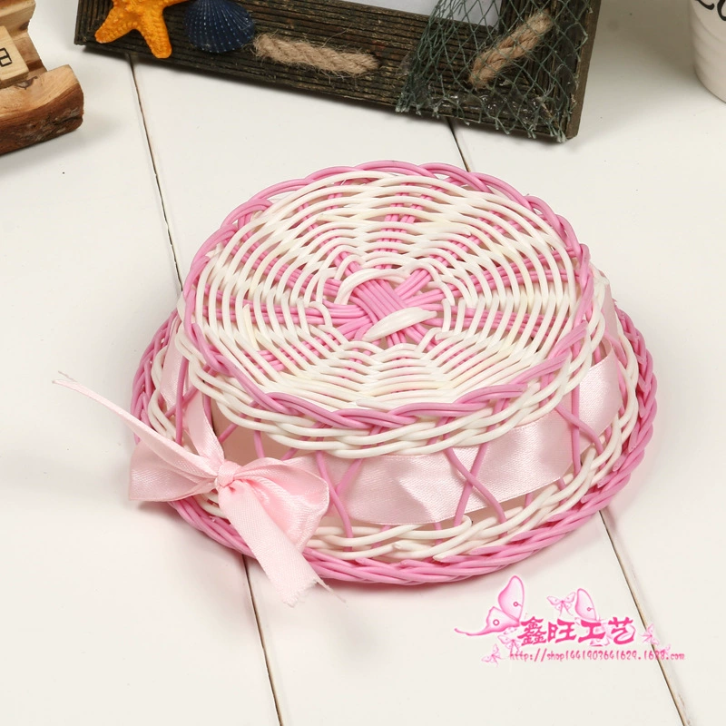 Factory direct sales of plastic rattan woven storage baskets, home sundries storage baskets, bow ornaments wholesale
