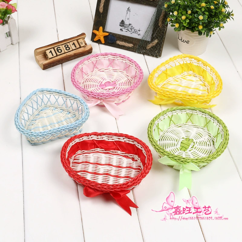 Factory direct sales of plastic rattan woven storage baskets, home sundries storage baskets, bow ornaments wholesale