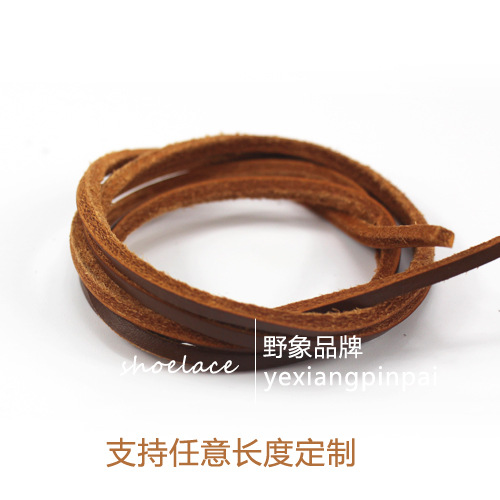 Elefante salvaje zapatos de piel de vaca Correa guisantes zapatos de cuero precioso vela zapatos de cuero cuerda Martin botas militares botas de color blanco y negro cordones Casuales