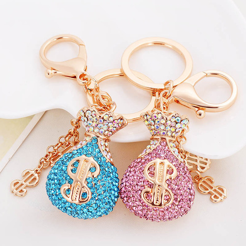Alloy diamond-encrusted dollar purse keychain car pendant lucky bag bag pendant manufacturer direct sale creative small gift