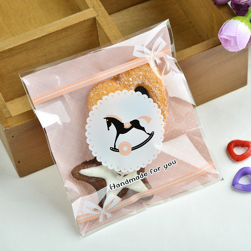 新款上市 童趣木马自粘袋 饼干袋 塑料袋 烘培包装7*7+3 100个价