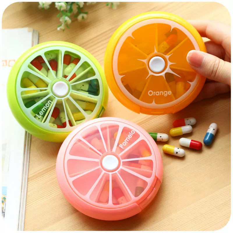 Fruit‑shaped plastic storage box, 7‑compartment portable pill organizer, 9×2.5 cm