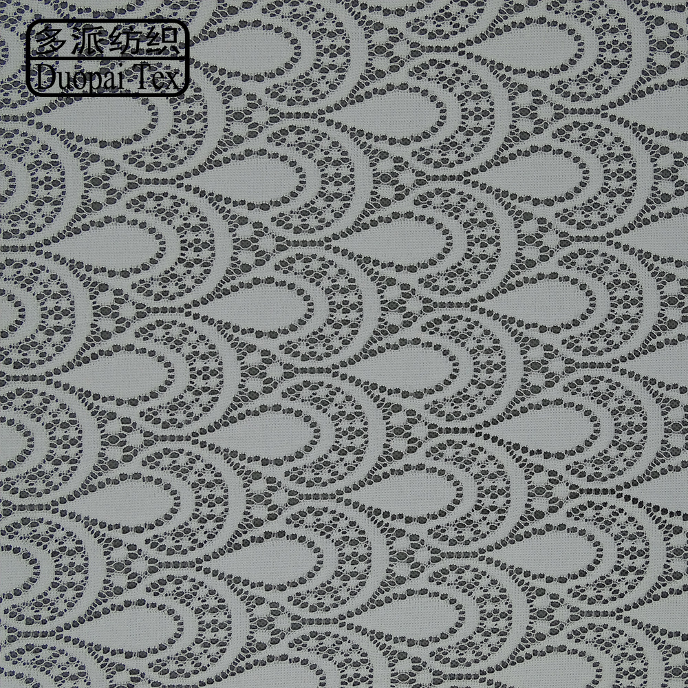 高端女士服饰尼龙无弹针织布料 欧美经编压纱版蕾丝面料 源头厂家