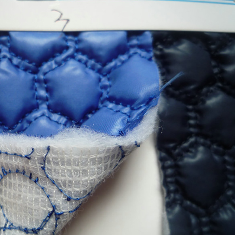 厂家直销 绗缝布料 绣花服装布羽绒服棉服箱包服装面料绗缝布