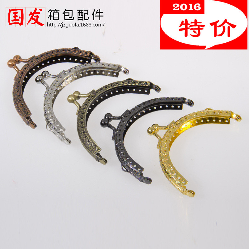 Explosiones de precio único oreja 8.5CM máquina de relieve semicircular cabeza oro bolso de cambio oro bisagra de bolso