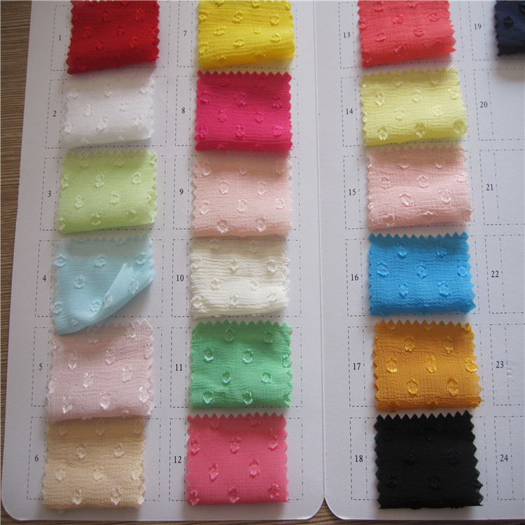 新款春夏高品质女装时装面料 雪纺小提花 剪花面料 手感超好