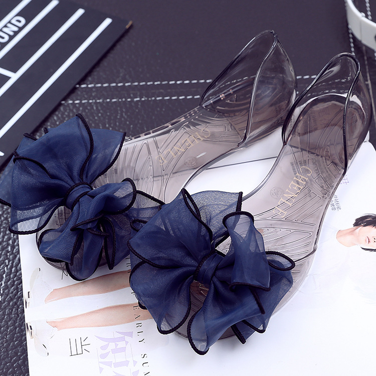 Nuevo arco grande flor jalea zapatos transparentes Sandalias planas de las mujeres peep toe zapatos de Playa del todo-fósforo zapatos