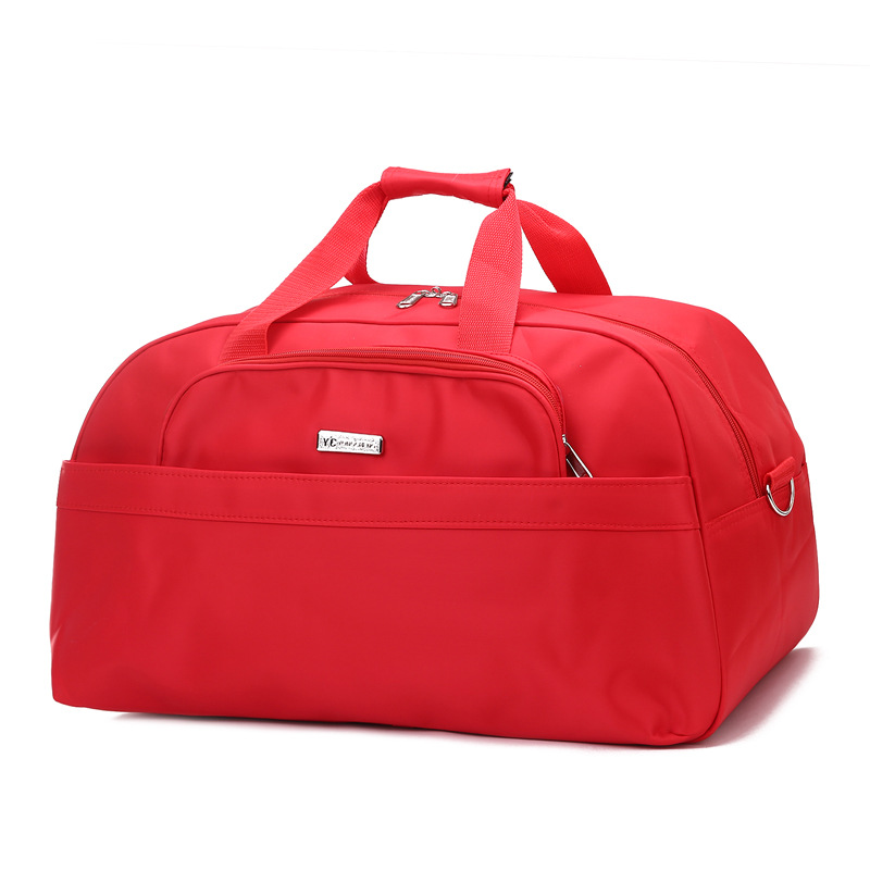 批发纯色旅行袋防水大容量行李包短途旅游袋男女时尚运动健身包袋