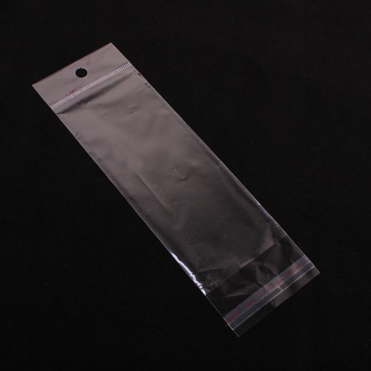 厂家直销  包装饰品透明opp袋子 4.5*18cm 带挂带胶内空4.5*12.5
