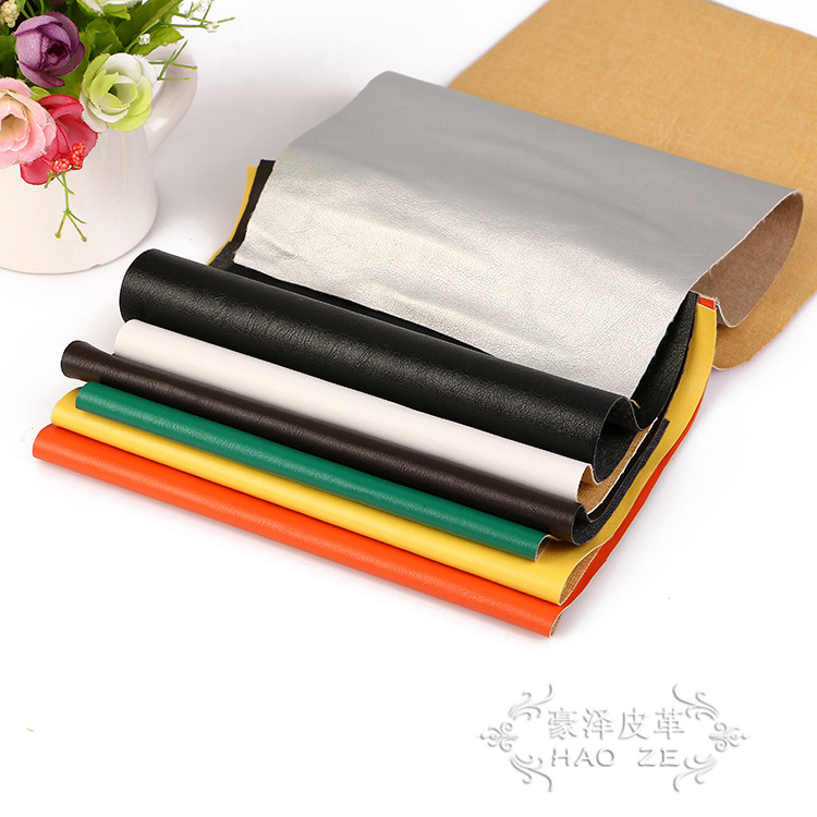 厂家批发 人造皮革纺织皮革 全PU革皮箱包装饰人造皮革面料