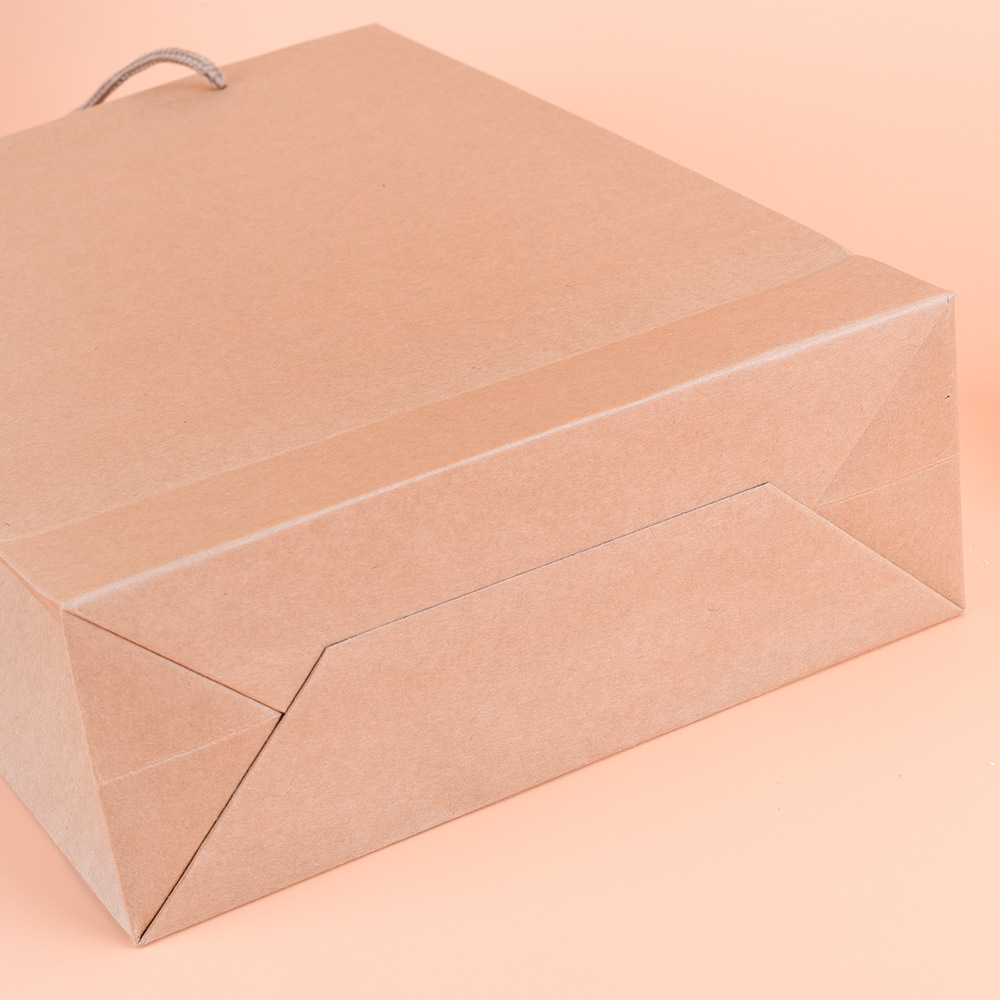 Wholesale spot thickened portable yellow leather paper bag custom clothing creative gift packaging shopping bag custom