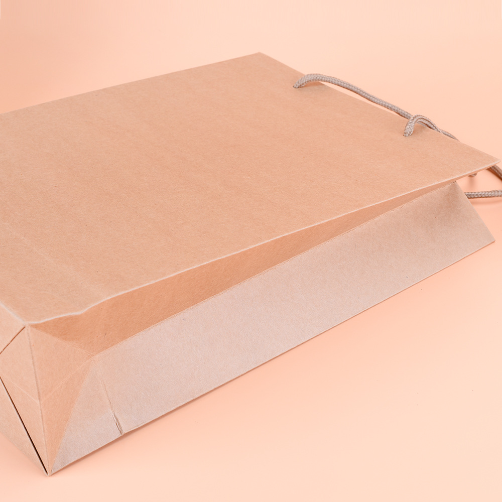 Wholesale spot thickened portable yellow leather paper bag custom clothing creative gift packaging shopping bag custom