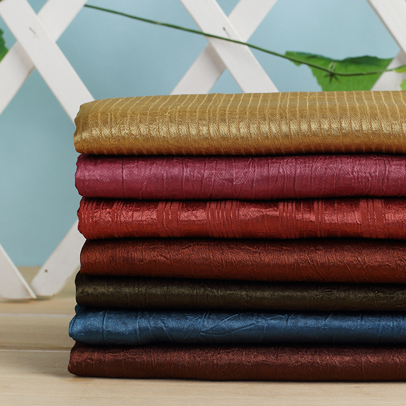 厂家直供顺宇绉化纤服装面料流行全涤纶时装布料可订货生产