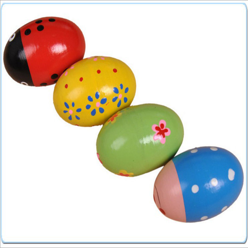 Nuevo exquisito huevo de arena de colores de alta calidad de madera redonda Bola de arena de los niños de educación temprana de inteligencia instrumento de percusión de juguete