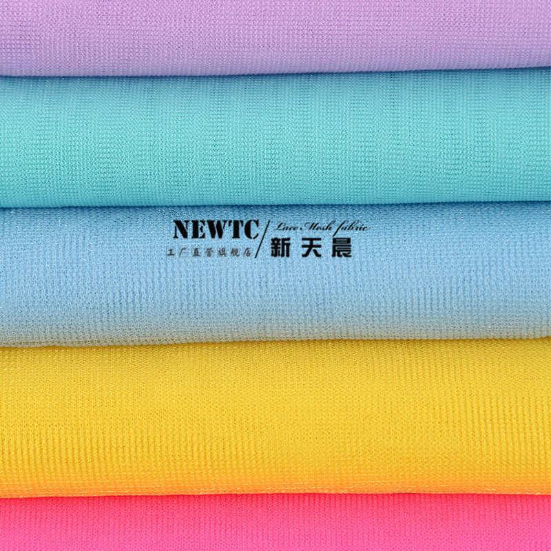 现货柔软经编锦纶9A平布现货批发 时尚婚纱礼服网眼布面料