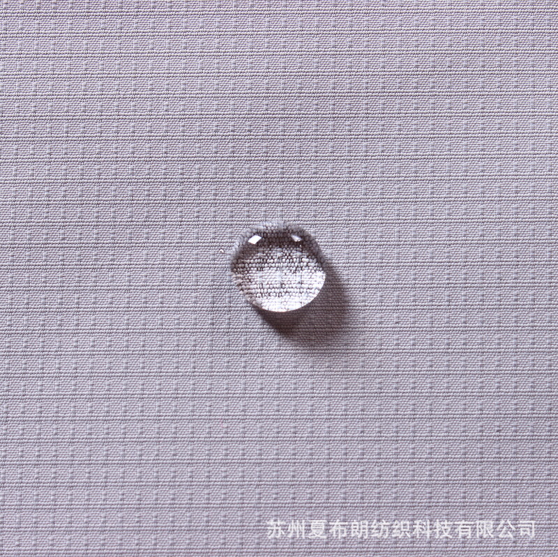 300T双线格中点全涤春亚纺布 复TPU白膜防水防风运动学生校服面料