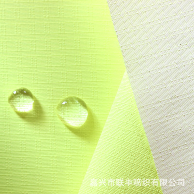 厂家供应 涤纶涂白荧光布75D*150D回字格子春亚纺透湿白 反光面料