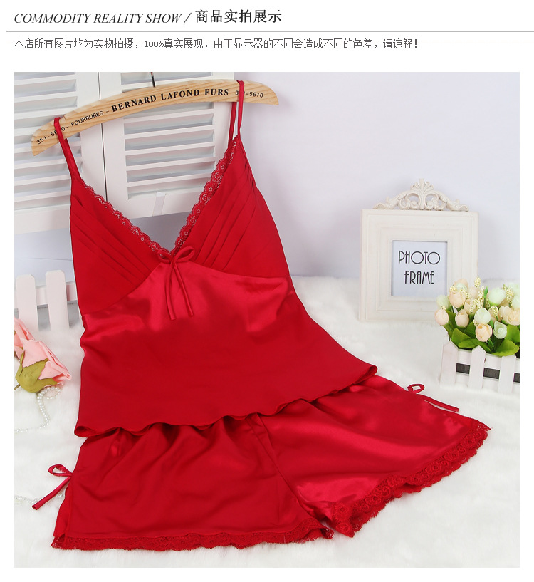 春の夏のストラップのパジャマの女性のセクシーな氷の糸の2つのセットはシルクの短い吊り下げの半ズボンの大きいサイズの薄い部屋の服を詰めます。