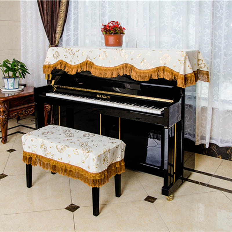Fabricante al por mayor tela patrón de moda nota media capa cubierta de piano cubierta a prueba de polvo cubierta de piano electrónica con flecos