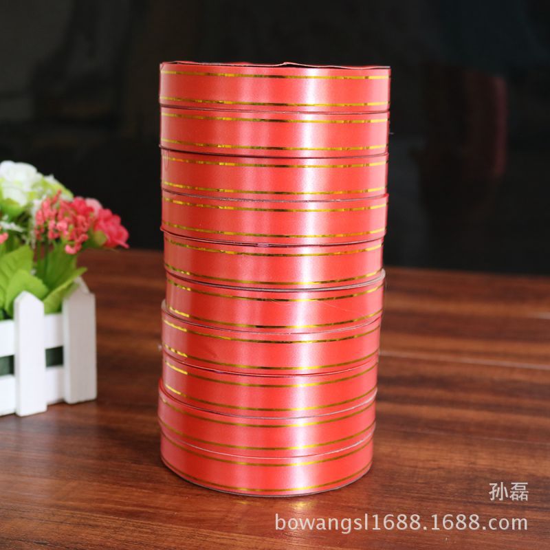 Yiwu al por mayor borde dorado cinta globo cinta carillón de viento seda ancho de banda 1,6 cm cerca de 10 yardas de largo embalaje cinta