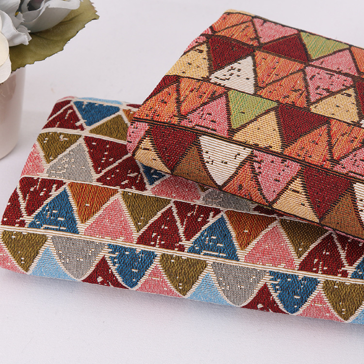 厂家直销涤棉平纹色织提花面料 民族风箱包提花面料现货供应