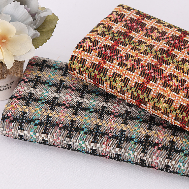 厂家热销涤棉民族风色织提花面料 箱包服装家纺面料现货批发