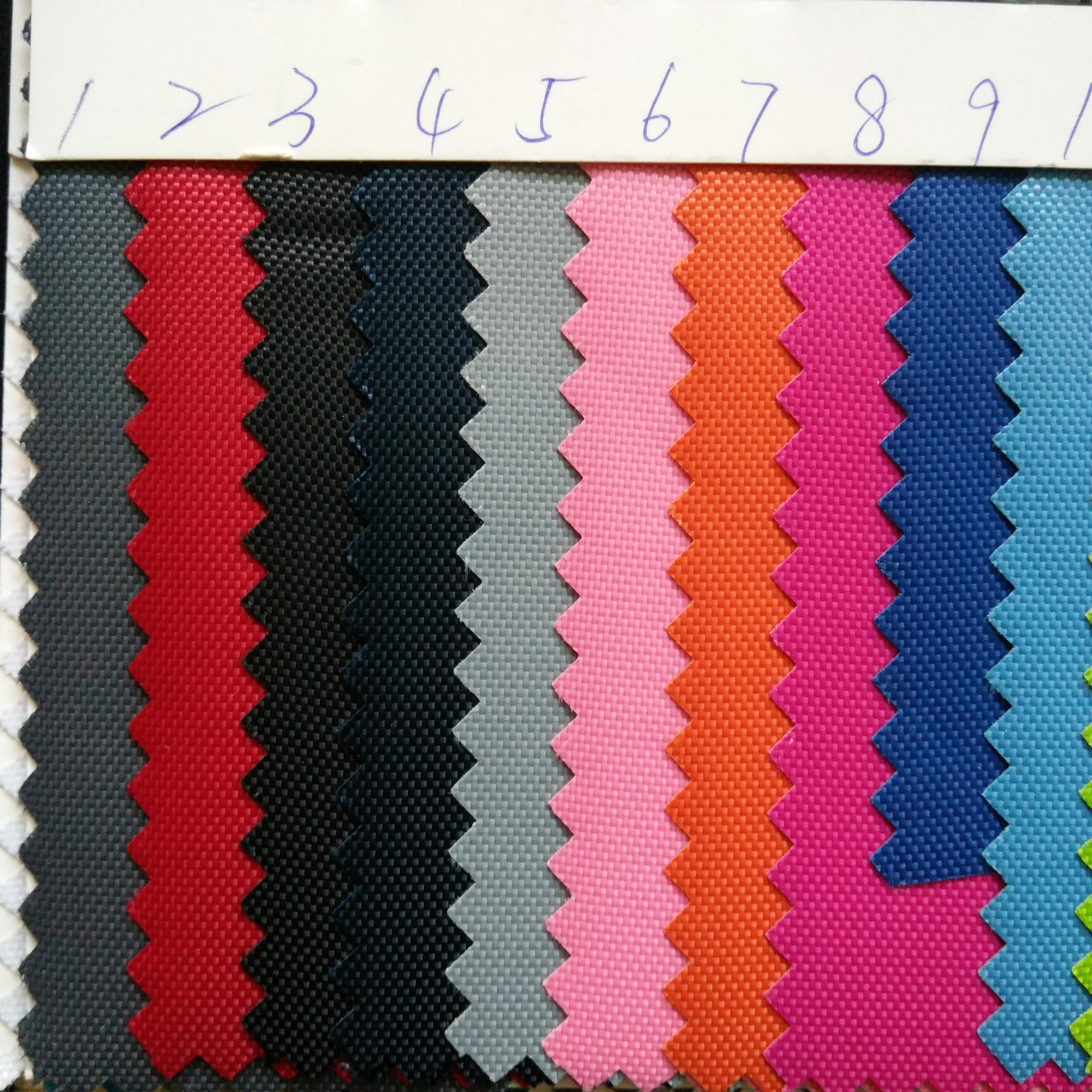 厂家现货供应涤纶420D仿尼龙pvc华南城批发布料手袋箱包牛津布料