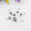 Diverse earplugs stainless steel, earrings with butterfly with accessories