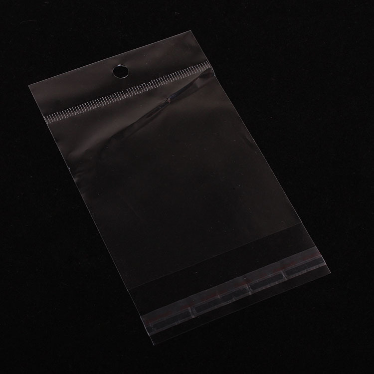 厂家直销 包装饰品透明opp袋子 7.5*12.5cm 带挂带胶内空7.5*9.5