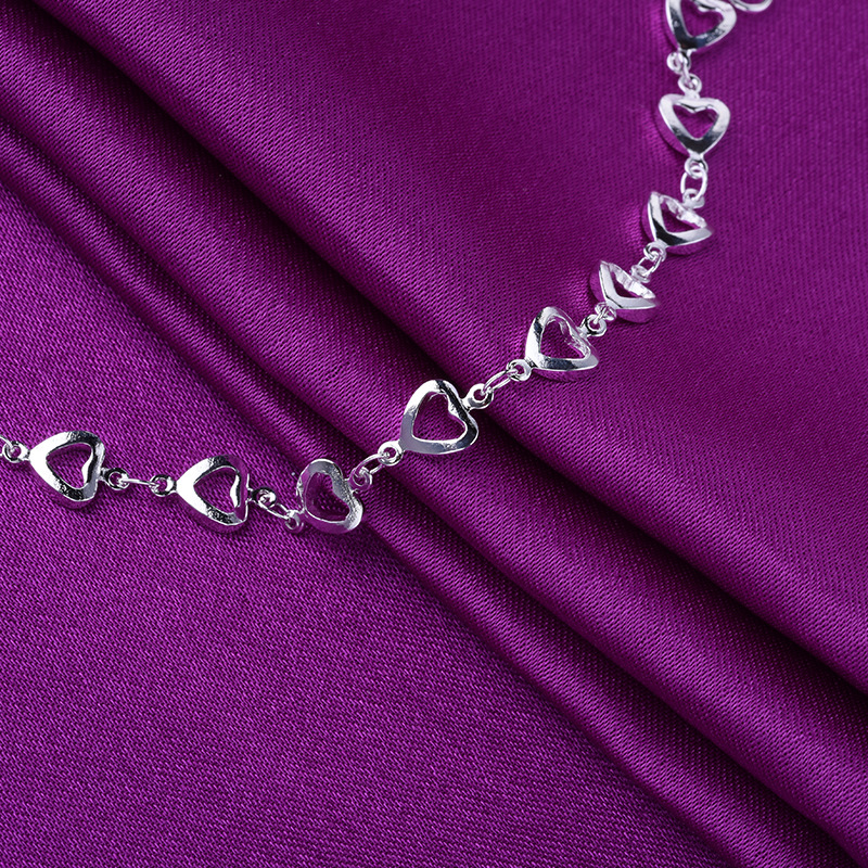 Directo de fábrica al por mayor Nueva moda coreana novias corazón a corazón tobillera de plata romántica amor hueco pulsera de las mujeres