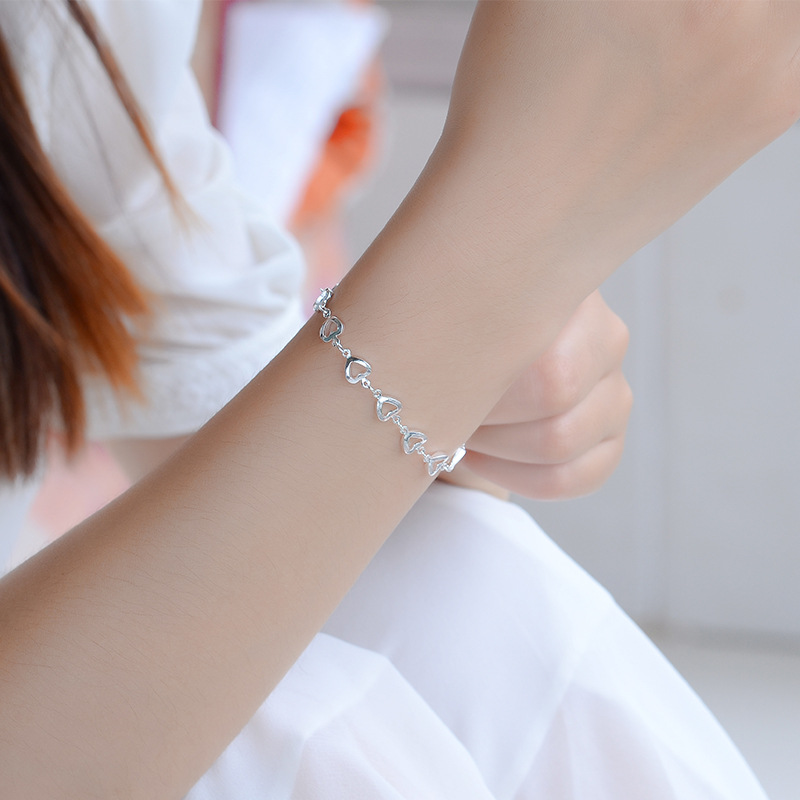 Directo de fábrica al por mayor Nueva moda coreana novias corazón a corazón tobillera de plata romántica amor hueco pulsera de las mujeres