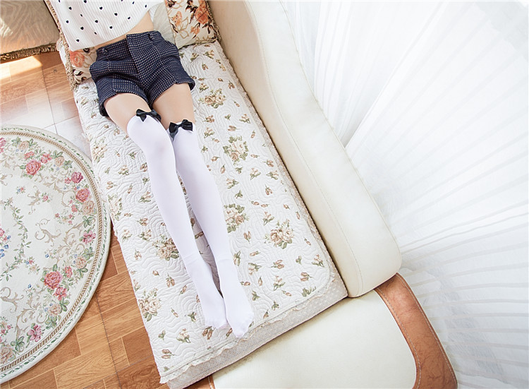 Medias de terciopelo arco tentación medias sexy de mujer Calcetines japoneses lindos sobre la rodilla al por mayor