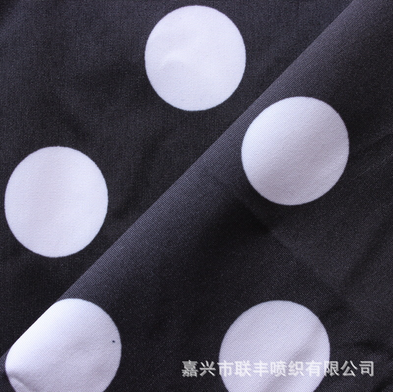 热销平纹桃皮绒圆点印花PU白涂层 棉衣夹克商务装沙滩裤服装面料