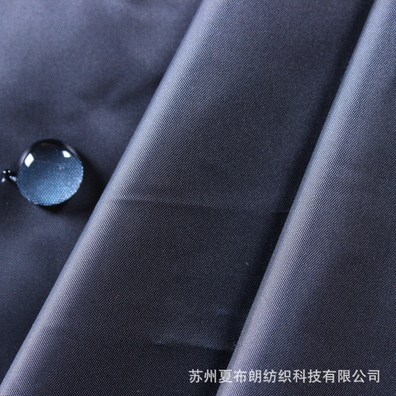 厂家热卖300t高F涤塔夫防水塔夫绸油面轧光秋冬羽绒服防绒面料