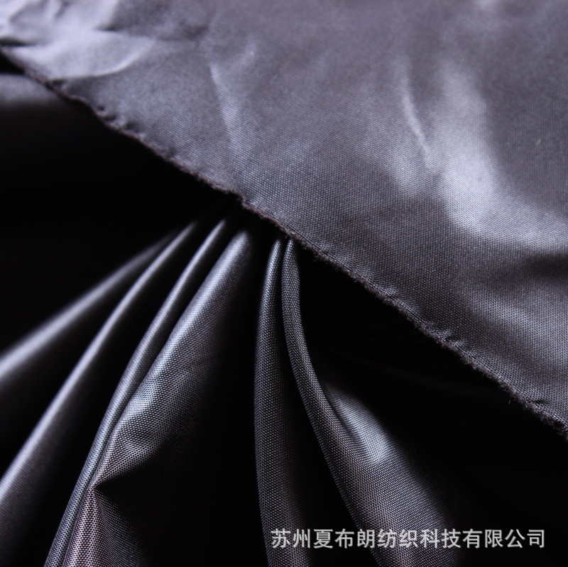 长期销售320T涤丝纺双面轧光高F涤塔夫防绒秋冬保暖羽绒服面料