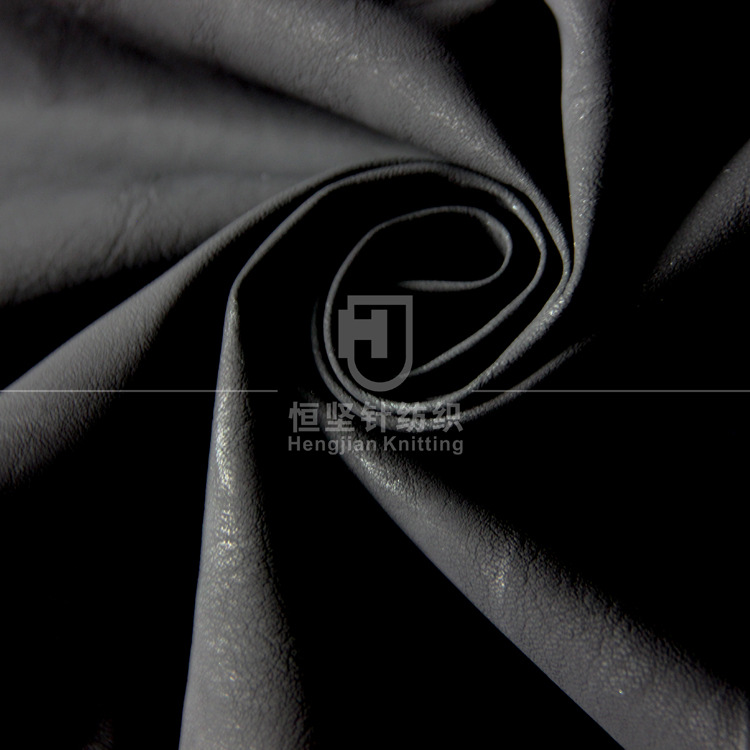 厂家直销 新款碳黑色仿皮 水洗发亮 环保 阻燃PU革服装革面料