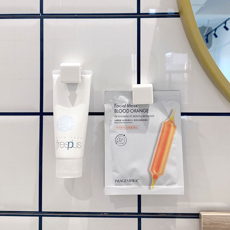 Wall-mounted toothpaste rack without punching, facial cleanser clip to squeeze toothpaste artifact, bathroom toilet wall storage