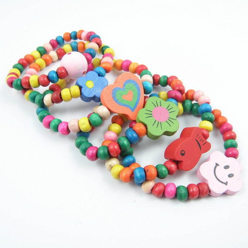 Los niños del color caramelo pulsera de madera juguete elástico cuerda mano bebé joyería AliExpress envío