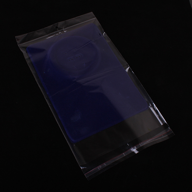 厂家直销   包装饰品透明opp袋子 19*32cm内空19*27带挂带胶